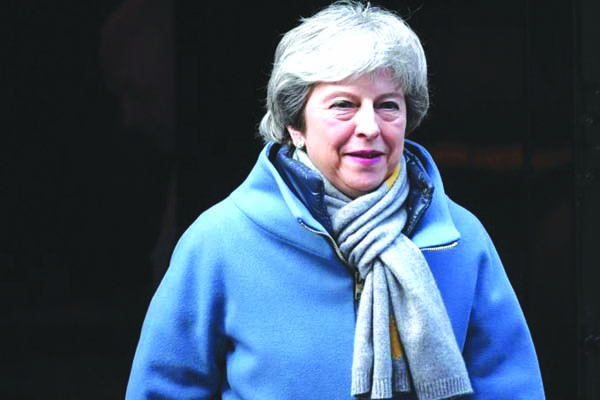 British Prime Minister Theresa May will write to EU President Donald Tusk with a plan for delaying Brexit beyond March 29, her spokesman said, admitting the parliamentary deadlock had reached crisis levels.