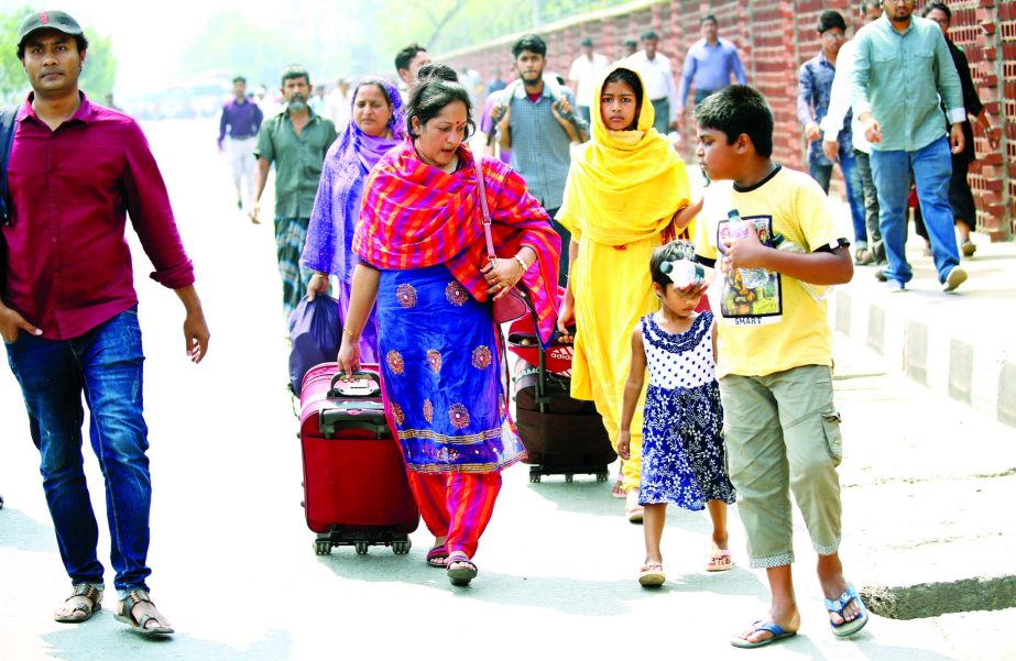 People's suffering mount as no vehicles available in the streets due to protests for killing of BUP student Abrar Ahmed. This photo was taken from city's Pragati Sarani on Wednesday.