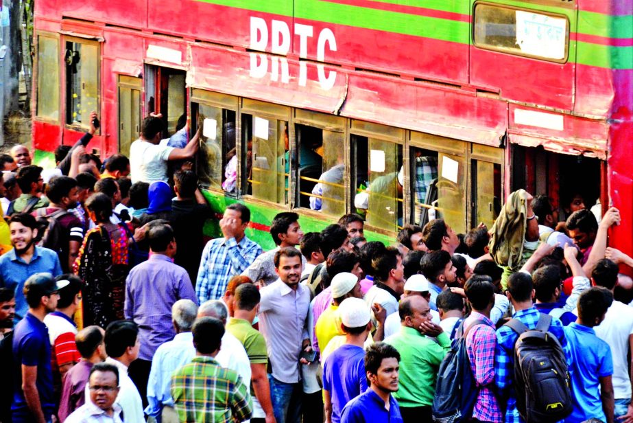 People of all strata of life fighting to aboard a rare BRTC bus as no vehicles available due to students demonstration in city streets on the second consecutive day of Abrar's killing on Wednesday.