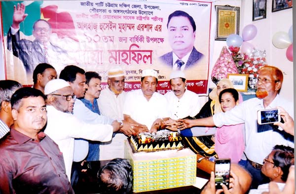 Leaders of Jatiya Party, Chattogram, South District Unit cutting cake on the occasion of the 90th birthday of Hussain Muhammad Ershad, Chairman of the party on Wednesday.