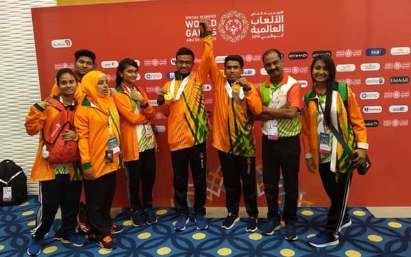 The gold winners and the officials of Bangladesh Special Olympic team pose for photograph at Abu Dhabi in United Arab Emirates on Wednesday.