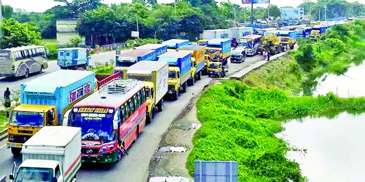 A 10 km tailback was created stretching from Meghna to Gumti Bridge in Daudkandi Upazila on Friday, causing immense sufferings to commuters.