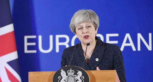 British Prime Minister Theresa May holds a press conference on Friday at the end of the first day of a EU summit focused on Brexit, in Brussels.