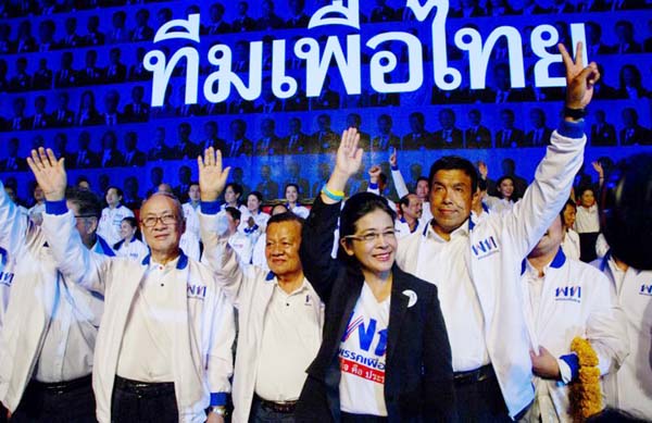 The leader of Pheu Thai Party and candidate for prime minister Sudarat Keyuraphan, second right, and contestants wave during an election rally of general elections in Bangkok, Thailand on Friday