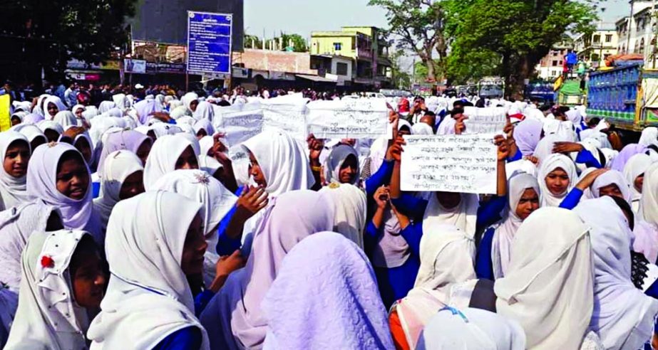 Girl students of Burujbagan Pilot Girls' School on Saturday blocked the Benapole-Jashore Highway, demanding compensation for their fellow Nipa who lost her right leg in road accident in Sharsha Upazila on Thursday.