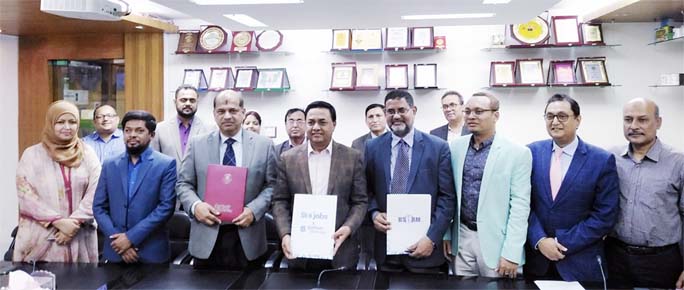 Mohammad Nuruzzaman, Chief Executive Officer of Skill Jobs, Prof Dr Yousuf Mahbubul Islam, Vice Chancellor of Daffodil International University and Mohammad Mashequr Rahman Khan, President of BSHRM exchanging MoU documents among themselves at Memorandum o