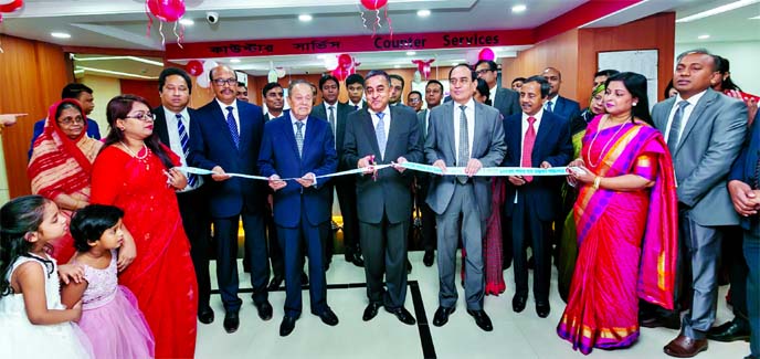 Sayeed H. Chowdhury, Chairman of ONE Bank Limited, inaugurating its 100th branch at Shantinagar in the city on Tuesday. Kazi Rukunuddin Ahmed, Shawkat Jaman, Directors, M. Fakhrul Alam, Managing Director, senior executives of the bank and businessmen were