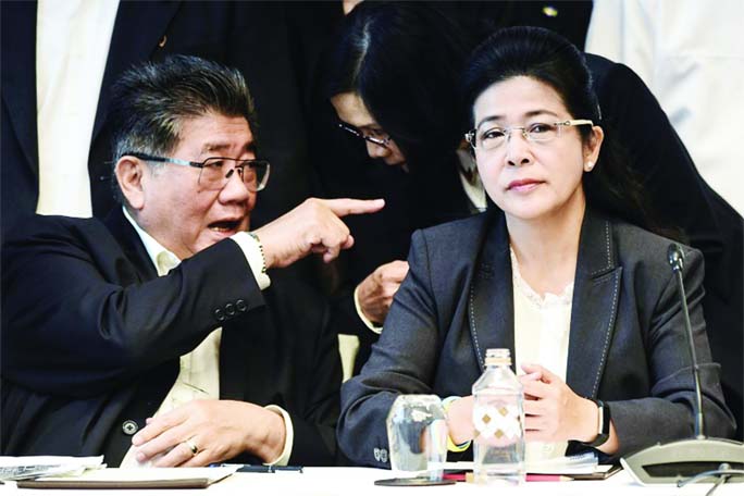 Pheu Thai party leaders Phumtham Wechayachai (L) and Sudarat Keyuraphan attend press conference in Bangkok.