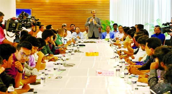 DNCC Mayor Atiqul Islam speaking with the agitated students at a meeting in the city on Thursday with a view to constructing safe road for reducing accidents.