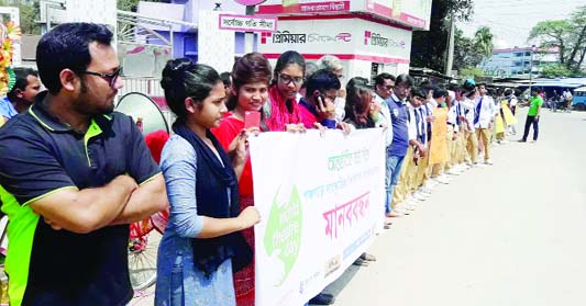 PANCHAGARH; Artists formed a human chain on Panchagarh- Dhaka Highway demanding a Cultural University on the occasion of the World Theatre Day organised by Bhumij, a drama institute on Wednesday.