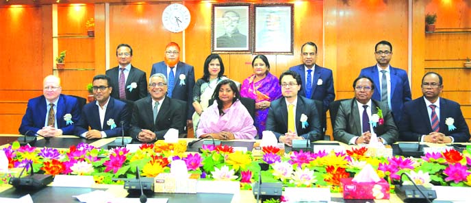 Luna Shamsuddoha, Chairman of Janata Bank and Janata Capital and Investment Limited, presiding over its 9th AGM at its head office in the city recently. Abdus Salam Azad, Managing Director of the Bank and shareholders of the capitals were also present.