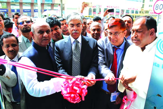 Dr. Muhammad Imran, Ambassador of Bangladesh to UAE, inaugurating the ATM operation of Janata BanK Limited, at Abu Dhabi recently. Amirul Hassan, Chief Executive, JBL UAE operation and other Bangladeshi expatriates attended the inaugural ceremony.