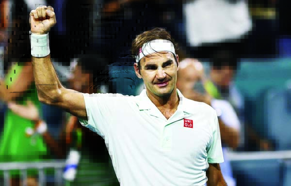 Roger Federer of Switzerland, celebrates his 6-2, 6-4 win over Denis Shapovalov of Canada, during the semifinals of the Miami Open tennis tournament on Friday.