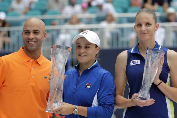 James Blake, director of the Miami Open (left) poses with Ashleigh Barty, of Australia (center) and Carolina Pliskova, of the Czech Republic (right) after the singles final of the Miami Open tennis tournament on Saturday.