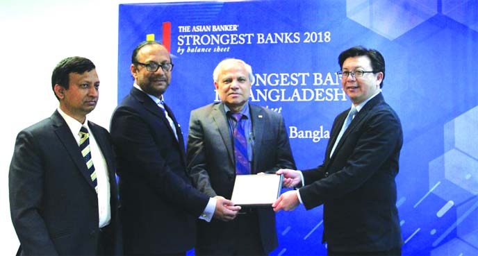 Chairman of Islami Bank Bangladesh Limited Professor Md. Nazmul Hassan, PhD, along with its Managing Director Md. Mahbub ul Alam, receiving the 'Strongest Bank in Bangladesh Award' from Foo Boon Ping, Managing Editor of The Asian Banker at a program in