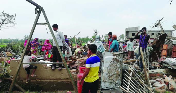 JOYPURHAT: Tornado ransacked five villages in Joypurhat on Tuesday noon. This snap was taken from Baguan Village.