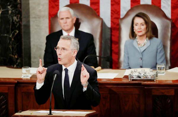 NATO Secretary General Jens Stoltenberg addresses a joint meeting of the U.S. Congress as Vice President Mike Pence and Speaker of the House Nancy Pelosi listen in the House Chamber on Capitol Hill in Washington on Wednesday.