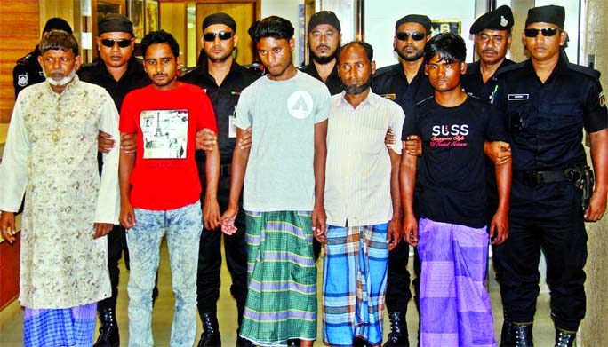 Six abductors were arrested by RAB-4 from Madhupur Bhawal forest in Tangail for abducting a homeopathic doctor from city's Mirpur area. This photo was taken from RAB Media Centre on Thursday.