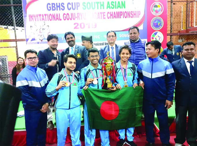 Members of Bangladesh Goju Ryu Karate team, which finish third in the International Goju Ryu Karate Championship with the guests and officials of South Asian Goju Ryu Karate Federation pose for photograph at Kathmandu, the capital city of Nepal recently.