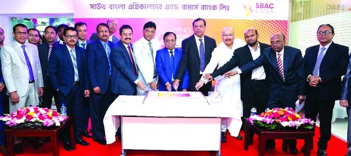 SBAC Bank Limited celebrates its 6th founding anniversary at its Bank's head office of in the city on Wednesday S. M. Amzad Hossain, Chairman of the Bank cutting a cake along with Bank's Director Mohammad Nawaz and Shakhawat Hossain, Independent Directo