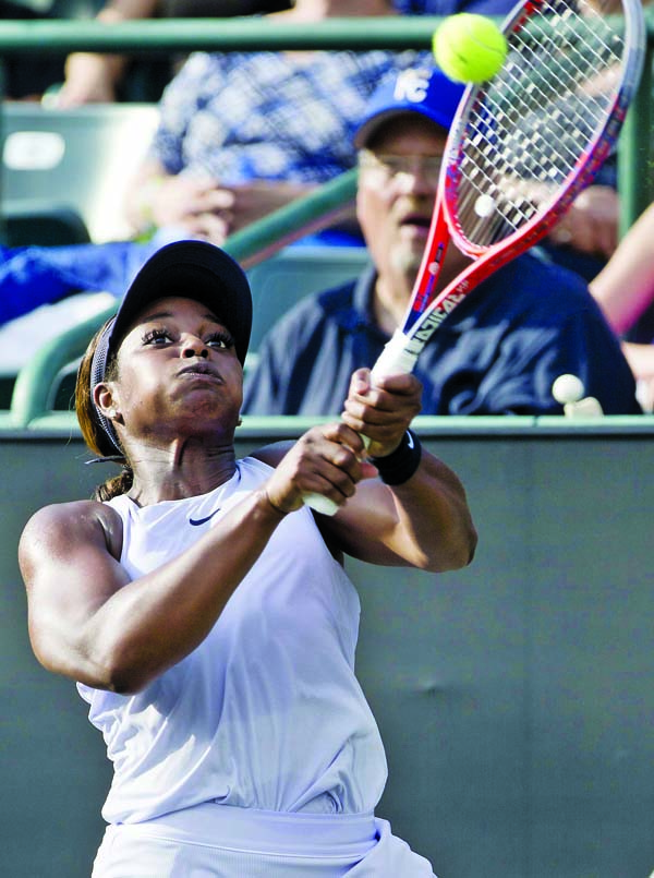 Sloane Stephens of the United States, reaches for a shot from countrywoman Madison Keys at the Volvo Car Open tennis tournament in Charleston, S.C on Friday.