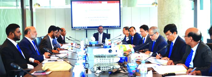 Dr. Anwer Hossain Khan, MP, Chairman of Shahjalal Islami Bank Securities Limited (SJIBSL), presiding over its 53rd meeting at the bank's head office in the city recently. Akkas Uddin Mollah, Chairman, Board of Directors of the Bank, Engineer Md. Towhidur