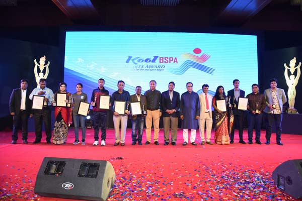 The winners of the Kool-BSPA Sports Award with the guests and officials of Bangladesh Sports Press Association (BSPA) pose for photograph at the Ball Room in the Pan Pacific Sonargaon Hotel on Saturday.