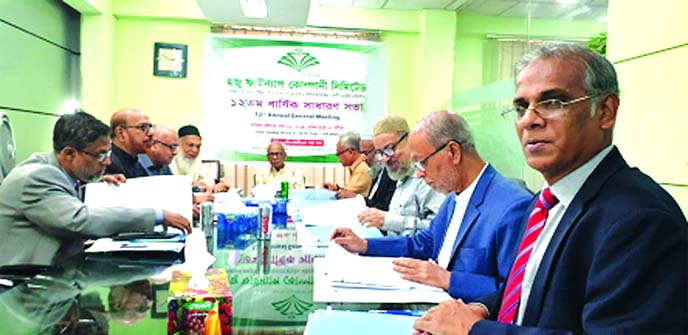 Barrister Rafique Ul Huq, Chairman of Hajj Finance Company Limited (Bangladesh-Malaysia joint venture Shariah based Non-Bank Financial Institution), presiding over its 12th AGM at its head office in the city recently. The AGM declared 12.25 percent Cash D