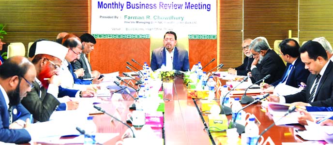 Farman R Chowdhury, Managing Director of Al-Arafah Islami Bank Limited, presiding over its Monthly Business Review Meeting at the bank's head office in the city on Saturday. Md. Fazlul Karim, Mohammed Zubair Wafa, DMDs, head office executives, zonal head