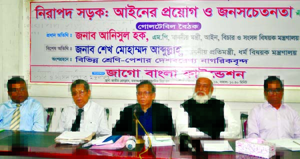 Law, Justice and Parliamentary Affairs Minister Anisul Haq speaking as Chief Guest at a roundtable on 'Safe Road: Enforcement of Law and Awareness' organiised by Jago Bangla Foundation at Jatiya Press Club yesterday.