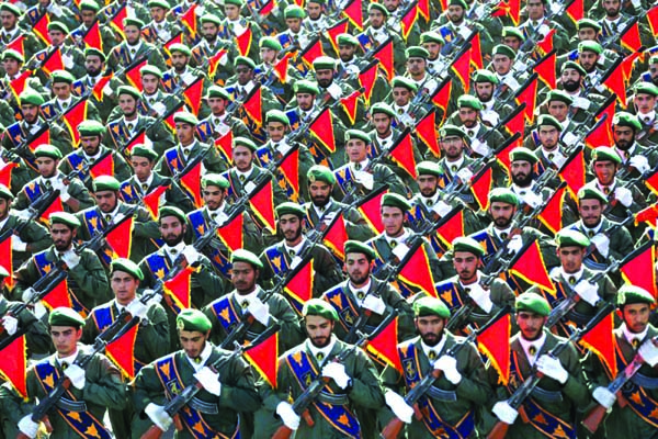 Iran's Revolutionary Guard troops march in a military parade marking the 36th anniversary of Iraq's 1980 invasion of Iran, in front of the shrine of late revolutionary founder Ayatollah Khomeini, just outside Tehran, Iran. AP file photo