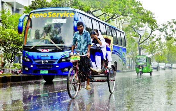 City people experienced heavy rain with hailstorm yesterday. This photo was taken from city's Motijheel area.