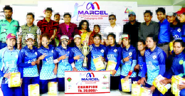 Members of Bangladesh Police, the joint-champions of the Marcel 3rd National Women's Baseball Championship with the guests and officials of Bangladesh Baseball-Softball Association pose for a photo session at the Sultana Kamal Women's Sports Complex in