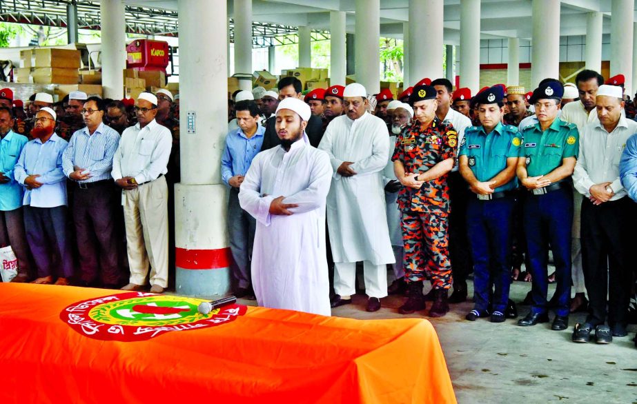 Home Minister Asaduzzaman Khan along with high officials of Fire Service and Civil Defence (FSCD) at the Namaz-e-Janaza of fire fighter Sohel Rana at the head office of FSCD in the city on Tuesday.