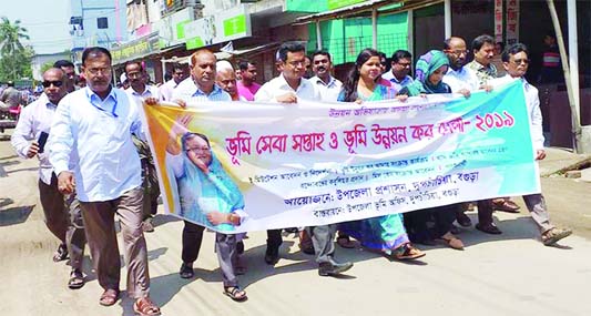 DUPCHANCHIA(Bogura): Dupchanchia Upazila Administration brought out a rally marking the Land Service Week and Land Developmentl Tax Fair in Dupchanchia on Wednesday.