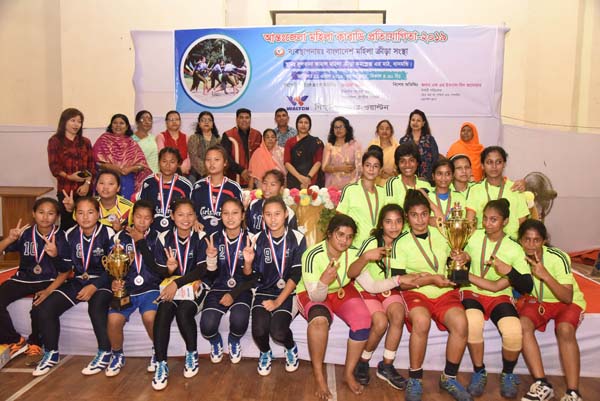 Kishoreganj District team (Wearing yellow jerseys), the champions of the Inter-District Women's Kabaddi Competition and Rangamati District team (Wearing navy blue jerseys), the runners-up of the Inter-District Women's Kabaddi Competition with the guests