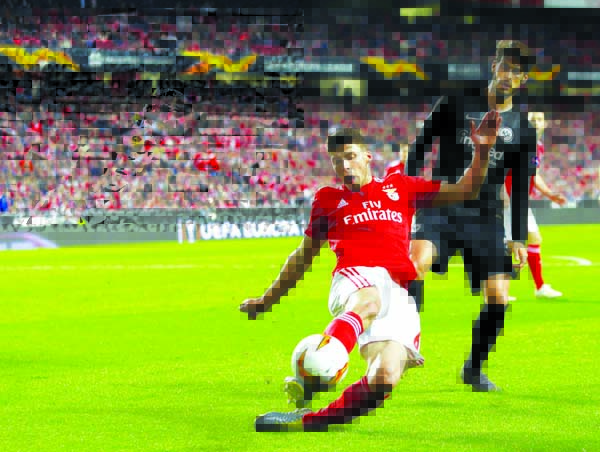 Benfica's Ruben Dias (left) duels for the ball with Frankfurt's Goncalo Paciencia during the Europa League quarterfinals, first leg, soccer match between Benfica and Eintracht Frankfurt at the Luz stadium in Lisbon on Thursday.