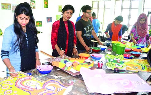 KHULNA: Students of Art Faculty of Khulan University passing busy time in making crafts on Friday marking the Pahela Baishakh today.