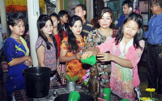Buddhist girls at Nobo Pandit Bihar in Katalganj performing rituals to welcome the Pahela Baishakh on Friday.
