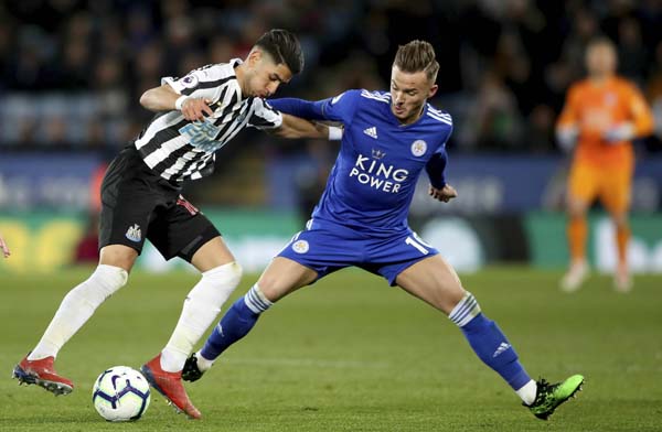 Leicester City's James Maddison (right) and Newcastle United's Ayoze Perez battle for the ball during the Premier League match at The King Power Stadium, Leicester on Friday.