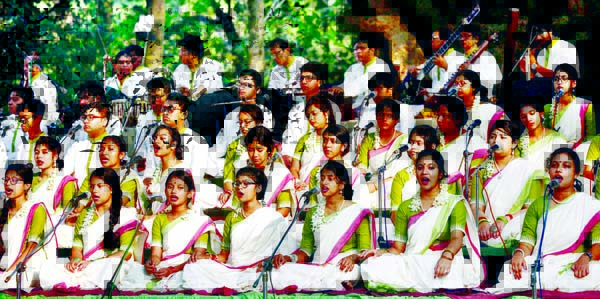Marking the Bengali New Year-1426, artistes of Chhayanaut performing songs at the Ramna Batomul on Sunday early morning.