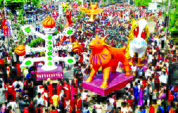 Marking the Bengali New Year 1426, a Mangal Shovajatra was brought out from Faculty of Fine Arts of Dhaka University on Sunday.