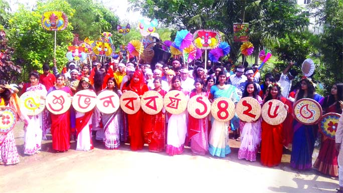 GOPALGANJ: Students of Fine Arts and Bengali Department, BSMRSTU, Gopalganj brought out a colourful rally marking the Bengali New Year on Sunday .