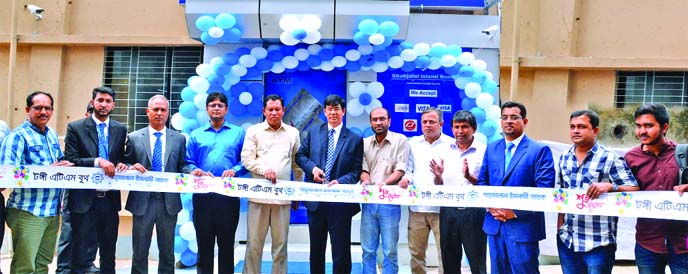 M Akhter Hossain, DMD of Shahjalal Islami Bank Limited, inaugurating an ATM booth at Q Pail Bhaban Premises in BSCIC Industrial Area in Tongi in Gazipur recently. Sayed Nasir, Managing Director of Q Pail Limited, Zobayer M shoyeb, Director of Ever Fashion