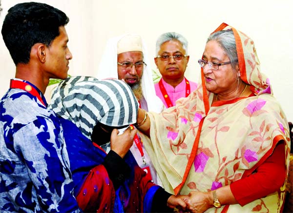 Prime Minister Sheikh Hasina consoles the family members of Feni Madrasa student Nusrat Jahan Rafi and assures them of all sorts of support at Ganobhaban on Monday.