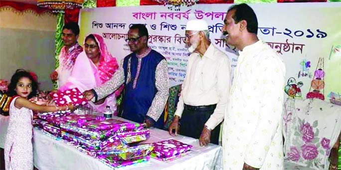 JHENAIDAH: Md Abdul Hai MP distributing prizes among the winners of cultural competition on the occasion of the Pahela Baishakh organised by Jhenaidah Shishu Academy on Sunday.