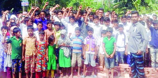 BARISHAL: Agitated local people and school-mates of Lamia, a student who was killed in a road accident, blocked Barishal-Swarupkati Road demanding immediate arrest of the killer driver and helper of the bus for crushing her under wheels on Wednesday.