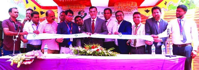 Md. Motaleb Hossain, DMD of Standard Bank Limited, inaugurating its 25thAgent Banking Outlet at Shakharidah Bazar in Harinakundu in Jhenaidah on Thursday. Md. Rezaur Rahman, Head of Agent Banking Division, Hossain-Al-Safeer Chowdhury, Head of SME Division