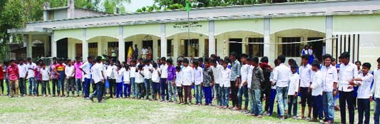 JOYPURHAT: Students of Hinda High School in Khetlal Upazila boycotting classes protesting several irregularities of the school on Thursday.