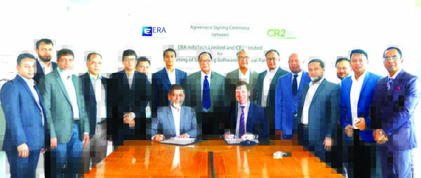 Fintan Byrne, CEO of CR2 (an Ireland based technology company) and Md. Serajul Islam, CEO of ERA-Infotech Limited, exchanging an agreement signing document to provide sophisticated software services to banks at ERA-InfoTech office in the city on Saturday.